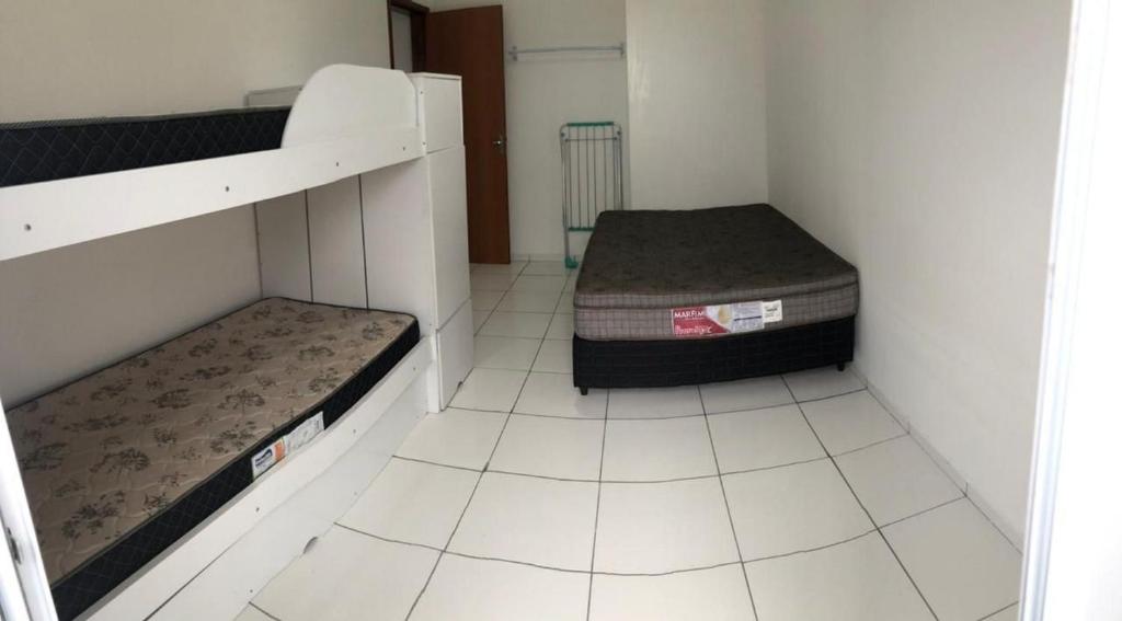 Alessandro Apartamento em Ubatuba room 3